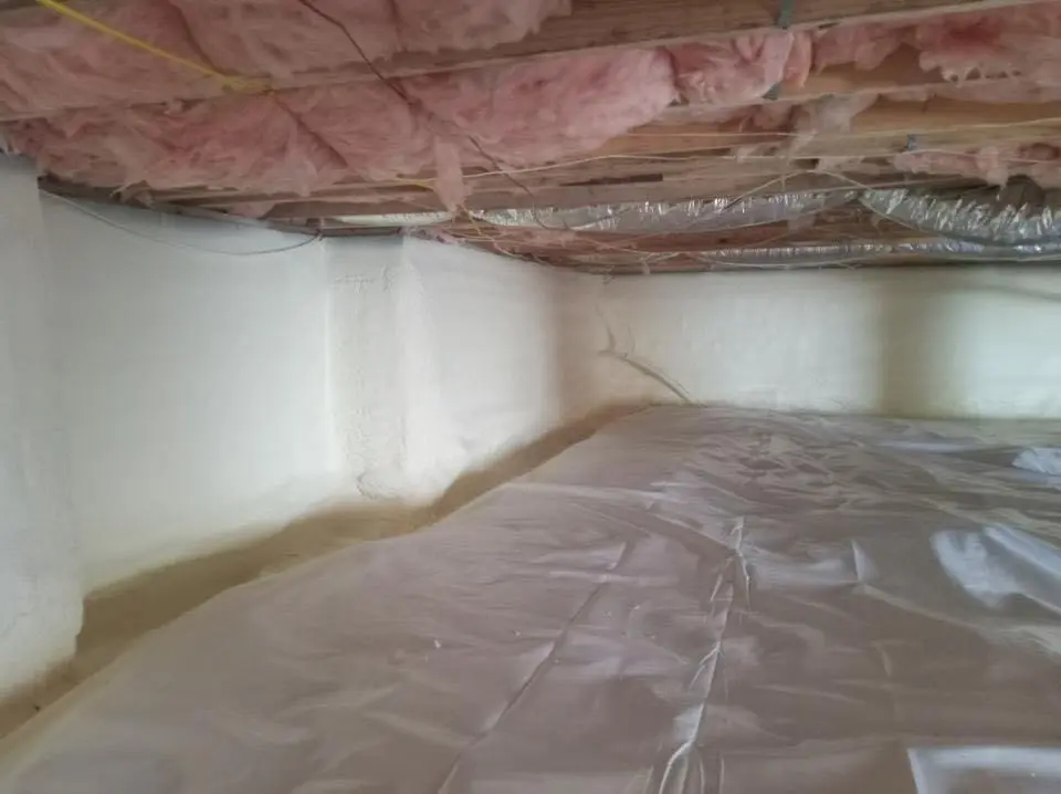 Crawl space encapsulation with closed-cell spray foam for Commercial Roof Restoration in Milford